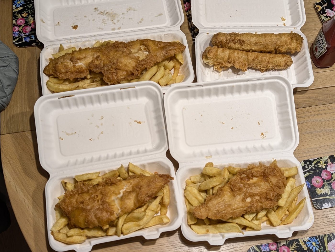 Four boxes of fish and chips